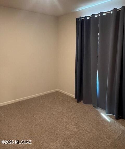 365 S Redwood Loop, Benson, AZ 85602 - spare room featuring carpet and baseboards