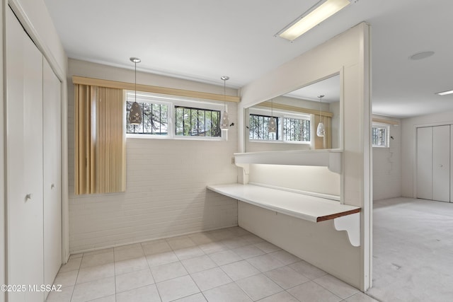 1047 E Hedrick Dr, Tucson, AZ 85719 - bathroom featuring healthy amount of natural light and tile patterned flooring