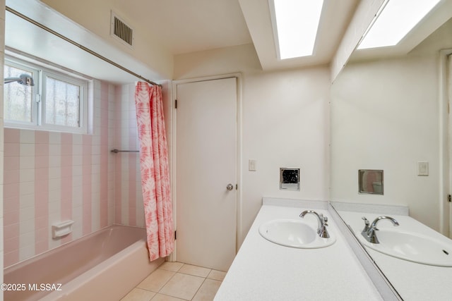 1047 E Hedrick Dr, Tucson, AZ 85719 - full bathroom with tile patterned flooring, vanity, and shower / tub combo