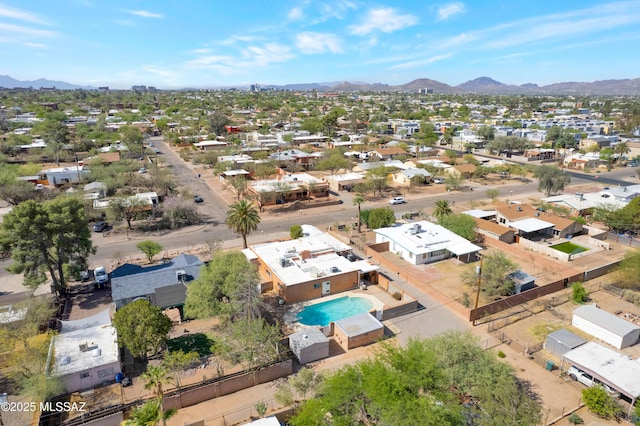 1047 E Hedrick Dr, Tucson, AZ 85719 - aerial view of residential area with a mountainous background and a pool area