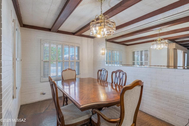1047 E Hedrick Dr, Tucson, AZ 85719 - dining room featuring a chandelier, beam ceiling, and brick wall