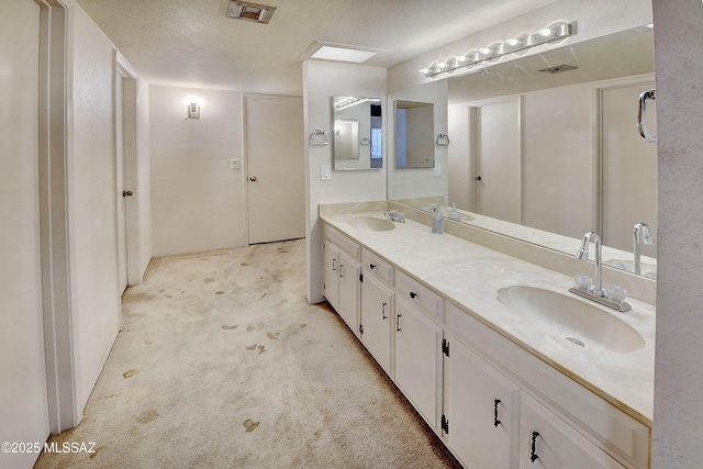 810 E Placita Leslie, Tucson, AZ 85718 - full bath with visible vents, a sink, and double vanity