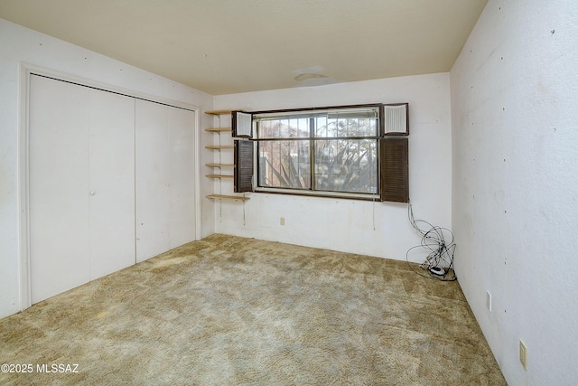 810 E Placita Leslie, Tucson, AZ 85718 - unfurnished bedroom with a closet and carpet