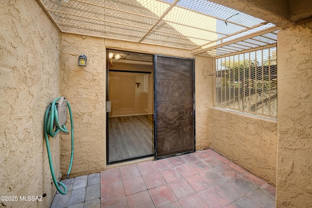 810 E Placita Leslie, Tucson, AZ 85718 - view of exterior entry featuring stucco siding