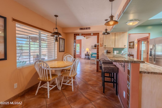 149 E Los Arcos, Green Valley, AZ 85614 - dining area with tile patterned flooring