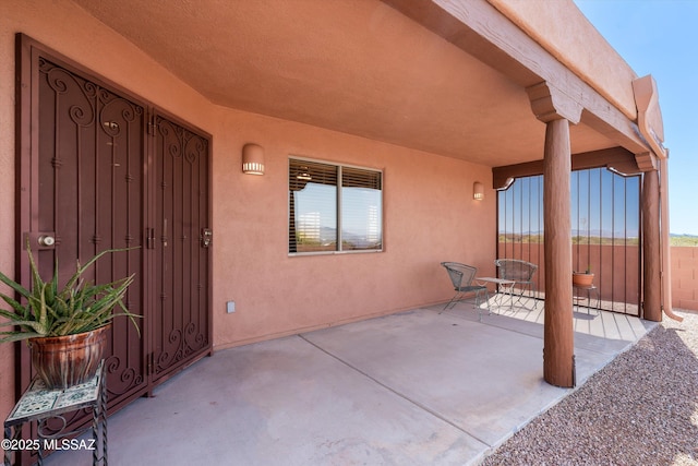 view of patio / terrace with fence