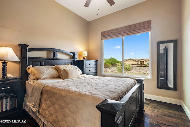 33 Camino Olympia, Rio Rico, AZ 85648 - bedroom featuring baseboards, dark wood finished floors, and a ceiling fan