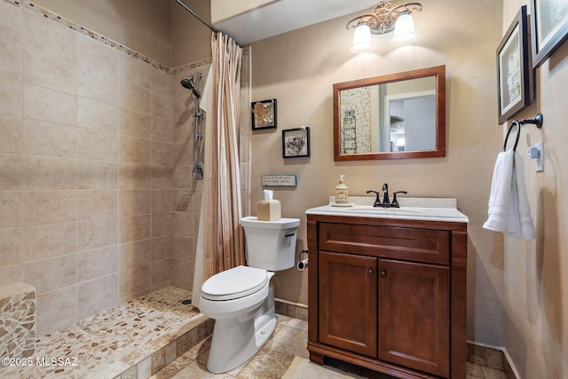 33 Camino Olympia, Rio Rico, AZ 85648 - bathroom with toilet, a tile shower, vanity, and baseboards
