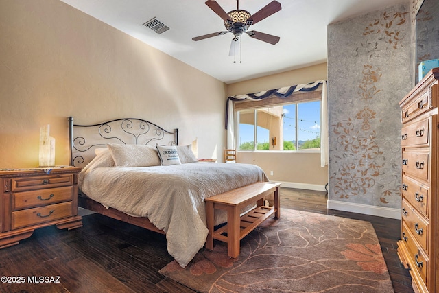 33 Camino Olympia, Rio Rico, AZ 85648 - bedroom featuring dark wood-type flooring, baseboards, and a ceiling fan