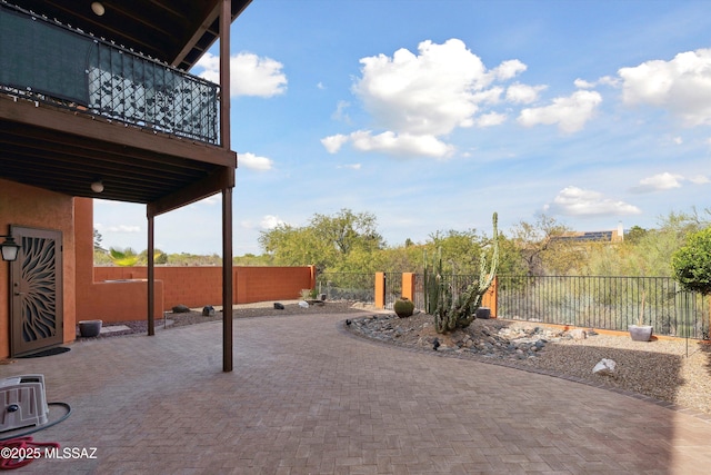 11846 N Copper Butte Dr, Oro Valley, AZ 85737 - view of patio / terrace featuring a fenced backyard and a balcony