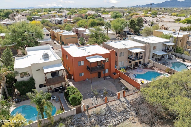 11846 N Copper Butte Dr, Oro Valley, AZ 85737 - aerial view of residential area with a pool and a mountainous background