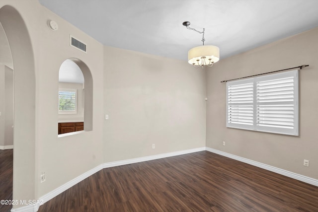 11846 N Copper Butte Dr, Oro Valley, AZ 85737 - spare room featuring wood finished floors and baseboards
