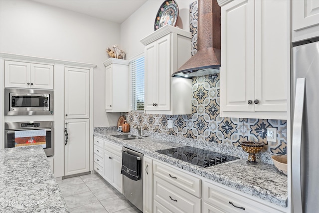 4544 N Camino Real, Tucson, AZ 85718 - kitchen with a sink, wall chimney exhaust hood, stainless steel appliances, white cabinets, and light stone counters