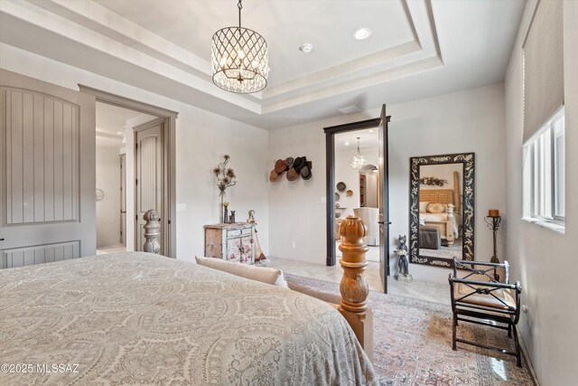 4544 N Camino Real, Tucson, AZ 85718 - bedroom with a tray ceiling, a chandelier, and recessed lighting