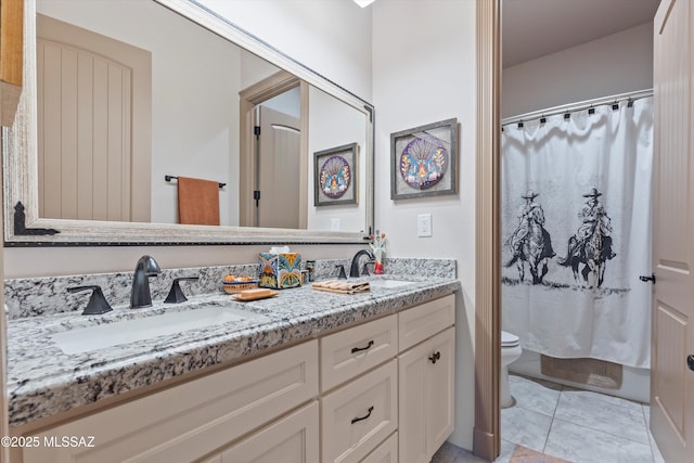 4544 N Camino Real, Tucson, AZ 85718 - bathroom featuring double vanity, toilet, curtained shower, and a sink