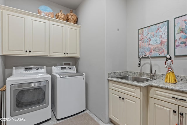 4544 N Camino Real, Tucson, AZ 85718 - washroom with washing machine and dryer, cabinet space, and a sink