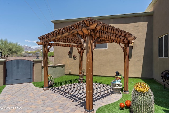 4544 N Camino Real, Tucson, AZ 85718 - view of patio featuring a mountain view, fence, a gate, and a pergola