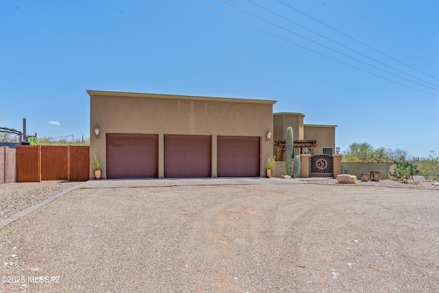 4544 N Camino Real, Tucson, AZ 85718 - adobe home featuring fence and stucco siding