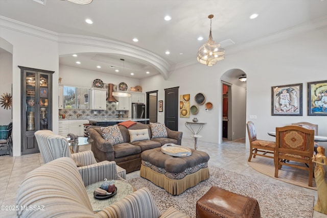 4544 N Camino Real, Tucson, AZ 85718 - living area with ornamental molding, light tile patterned floors, arched walkways, and recessed lighting