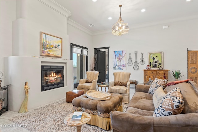 4544 N Camino Real, Tucson, AZ 85718 - living room with ornamental molding, a glass covered fireplace, visible vents, and recessed lighting