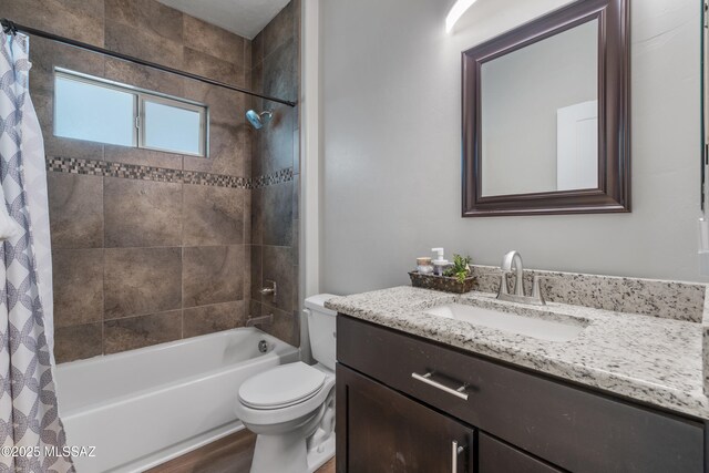 156 E Stone Ct, Tucson, AZ 85705 - full bath featuring toilet, vanity, and shower / bathtub combination with curtain