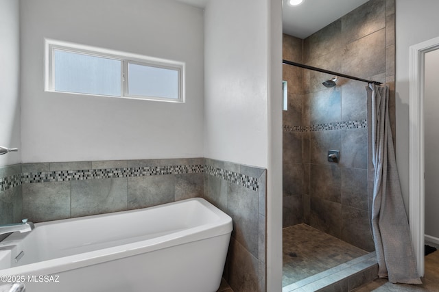156 E Stone Ct, Tucson, AZ 85705 - full bath featuring a bathtub and a stall shower
