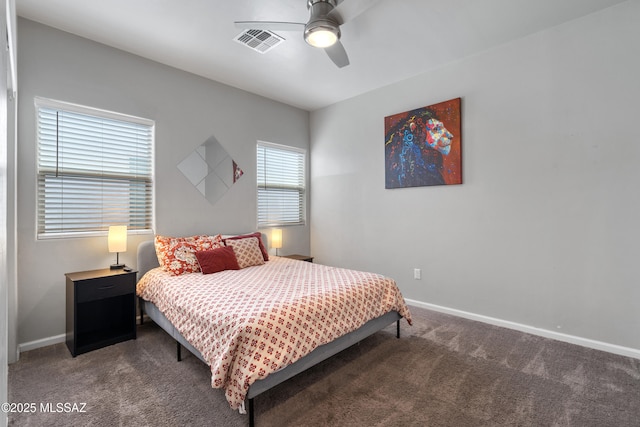 156 E Stone Ct, Tucson, AZ 85705 - carpeted bedroom featuring baseboards and ceiling fan