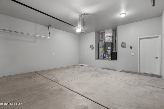 156 E Stone Ct, Tucson, AZ 85705 - garage with a garage door opener, heating unit, and water heater