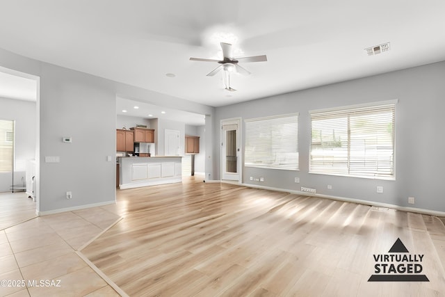 1933 E Lafayette Ave, Gilbert, AZ 85298 - unfurnished living room featuring visible vents, baseboards, a ceiling fan, and recessed lighting
