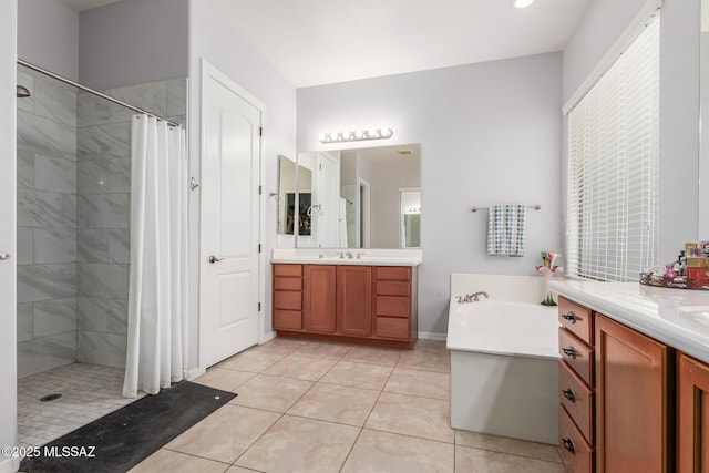 1933 E Lafayette Ave, Gilbert, AZ 85298 - bathroom featuring a garden tub, tiled shower, two vanities, and a sink