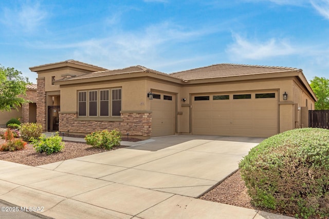 1933 E Lafayette Ave, Gilbert, AZ 85298 - prairie-style home with an attached garage, stone siding, driveway, stucco siding, and a tiled roof