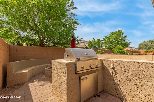 1933 E Lafayette Ave, Gilbert, AZ 85298 - view of patio / terrace featuring an outdoor kitchen, area for grilling, and a fenced backyard