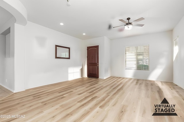 1933 E Lafayette Ave, Gilbert, AZ 85298 - unfurnished room with light wood-style floors, baseboards, ceiling fan, and recessed lighting