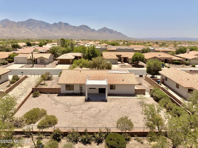 aerial view featuring a mountain view and a residential view
