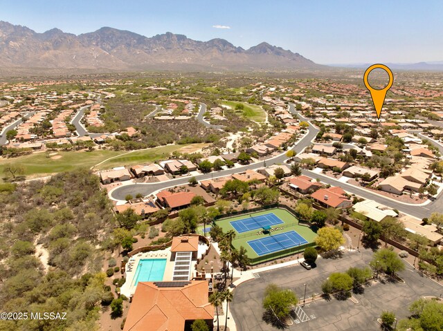 birds eye view of property featuring a mountain view and a residential view