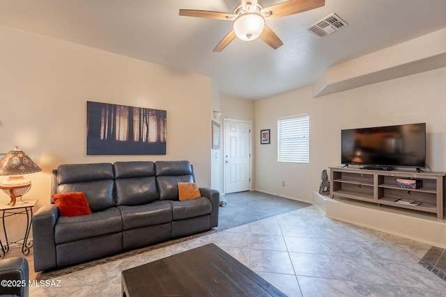 12445 N Crimson Vista Dr, Marana, AZ 85658 - living room featuring a ceiling fan, lofted ceiling, baseboards, and tile patterned flooring