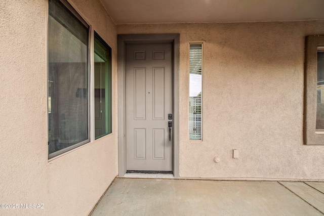 8695 W Cadwell Way, Marana, AZ 85653 - view of exterior entry with stucco siding