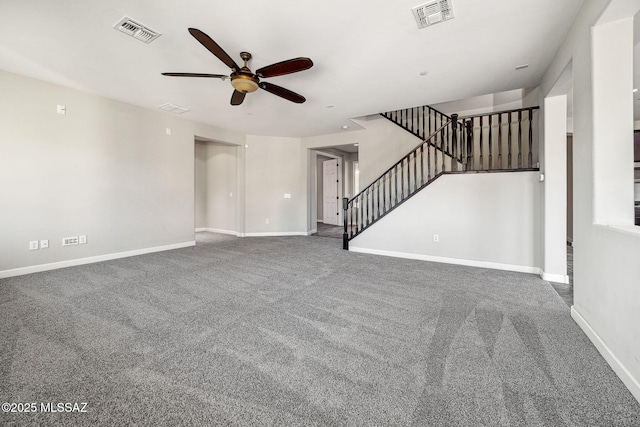 8695 W Cadwell Way, Marana, AZ 85653 - unfurnished living room with ceiling fan, stairs, carpet flooring, and baseboards