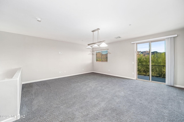 8695 W Cadwell Way, Marana, AZ 85653 - carpeted spare room with baseboards