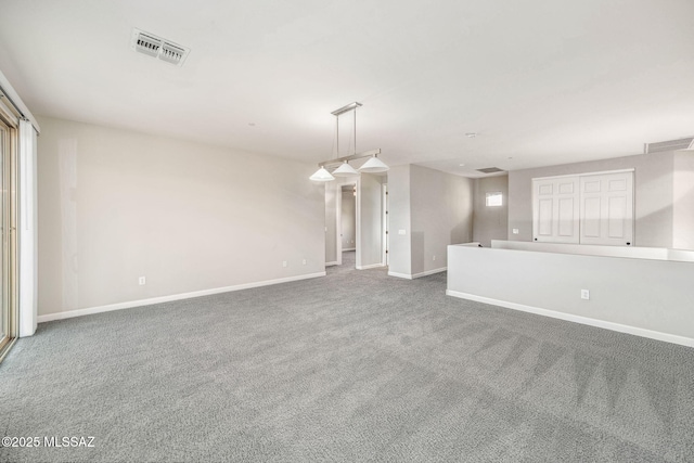 8695 W Cadwell Way, Marana, AZ 85653 - spare room featuring carpet floors and baseboards
