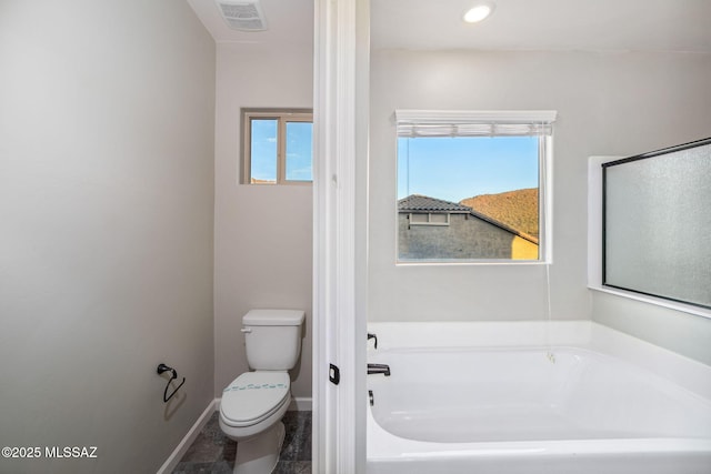 8695 W Cadwell Way, Marana, AZ 85653 - full bath with a bath, toilet, and baseboards