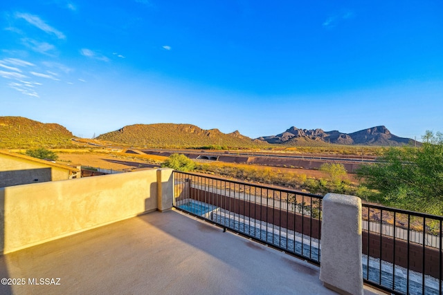 8695 W Cadwell Way, Marana, AZ 85653 - view of patio / terrace with a mountain view and a balcony