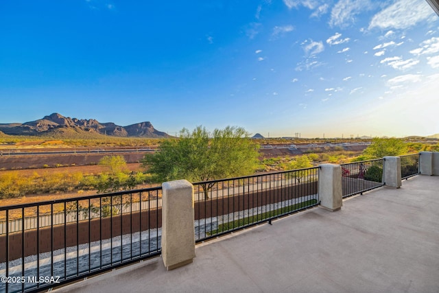 8695 W Cadwell Way, Marana, AZ 85653 - view of patio / terrace featuring a balcony and a mountain view