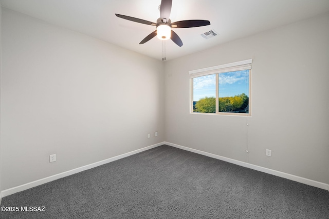 8695 W Cadwell Way, Marana, AZ 85653 - empty room featuring a ceiling fan, baseboards, and dark colored carpet