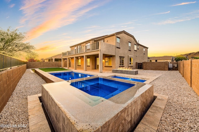 8695 W Cadwell Way, Marana, AZ 85653 - view of swimming pool featuring an in-ground hot tub, a fenced backyard, and a patio