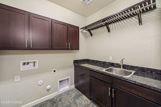 8695 W Cadwell Way, Marana, AZ 85653 - clothes washing area featuring hookup for a gas dryer, electric dryer hookup, cabinet space, hookup for a washing machine, and baseboards