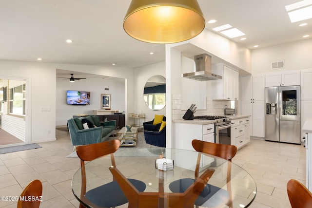 dining space featuring plenty of natural light, visible vents, a ceiling fan, and recessed lighting