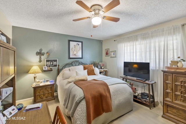 575 N Robles Rd, Oracle, AZ 85623 - bedroom with a textured ceiling and a ceiling fan