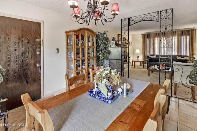 575 N Robles Rd, Oracle, AZ 85623 - dining area featuring a chandelier and a textured ceiling