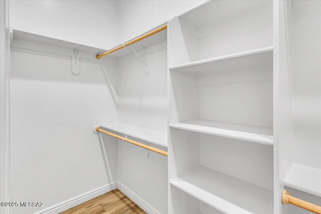 135 W Hawk Way, Amado, AZ 85645 - spare room featuring baseboards and wood finished floors